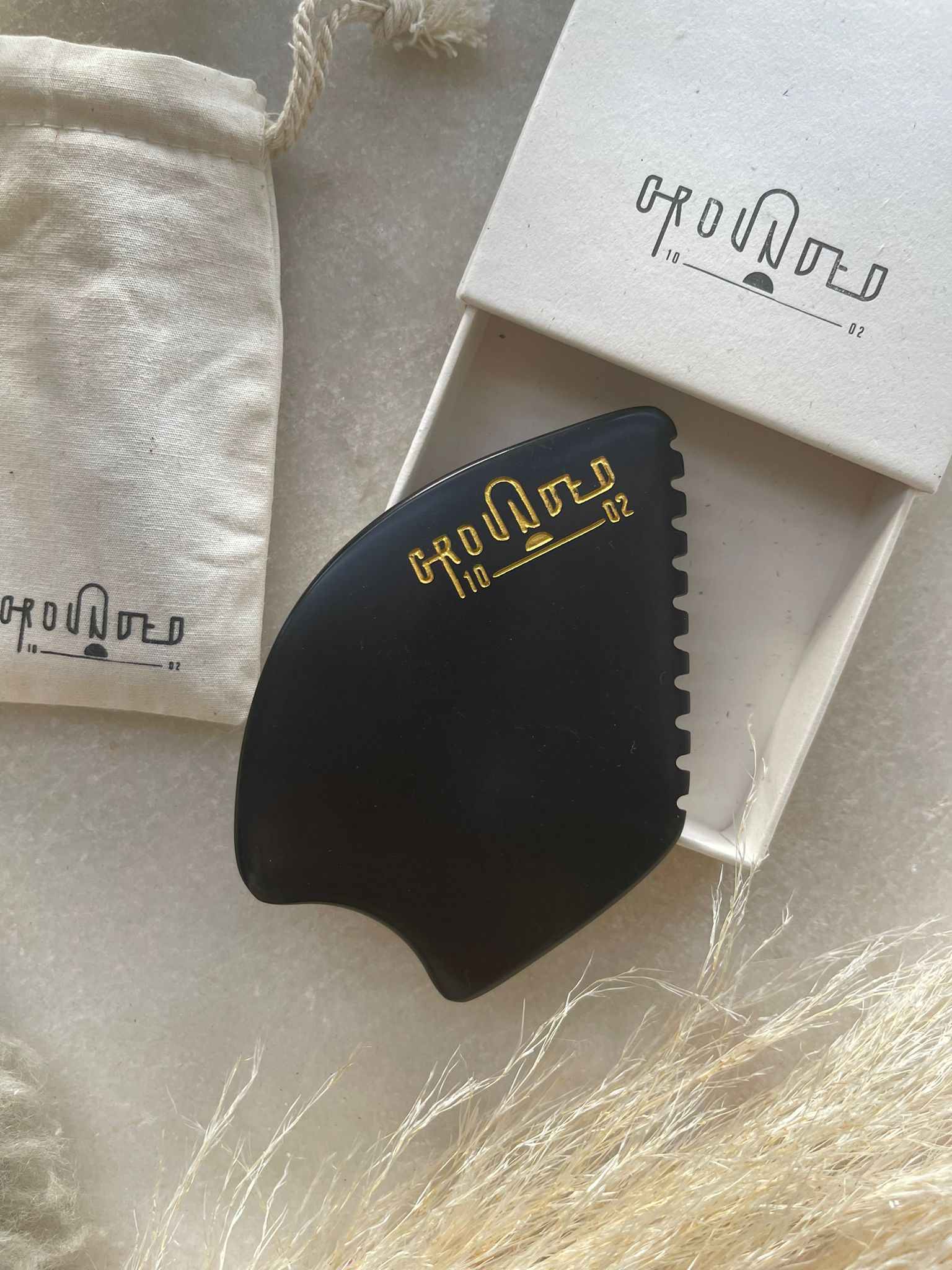 Grounded1002 - Rock With Care Bian-Stone Guasha